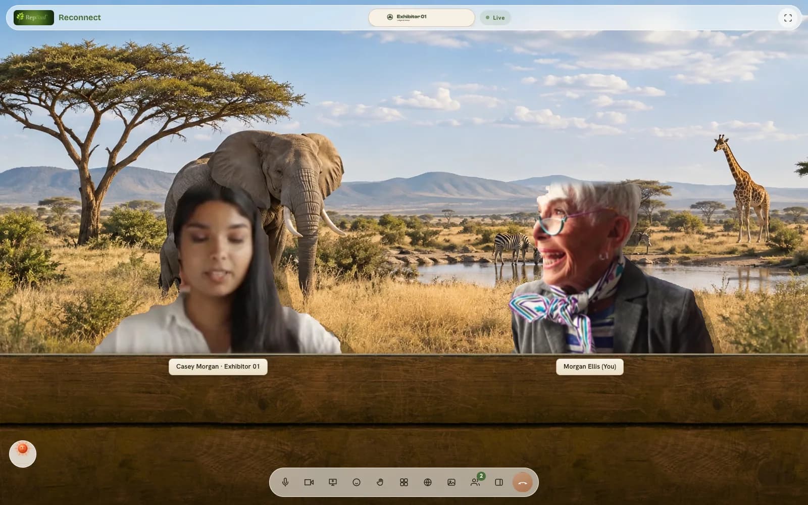 A meeting inside an exhibitor's cabin: two people talking across the table in a sample exhibitor's branded cabin